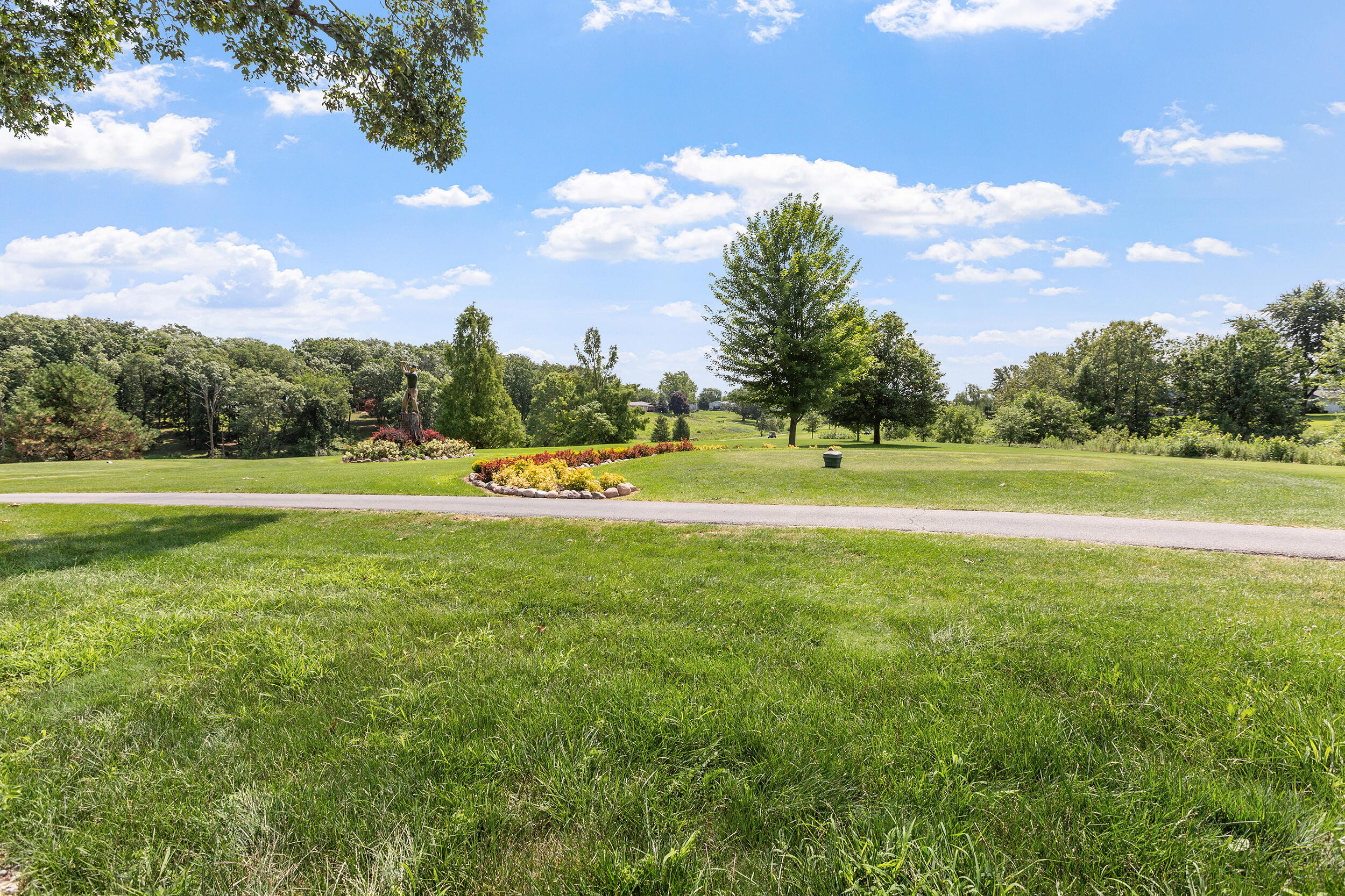4152 Oakmont Court Crown Point, IN 46307 - Photo 34 of 34 a view of a golf course with a lake