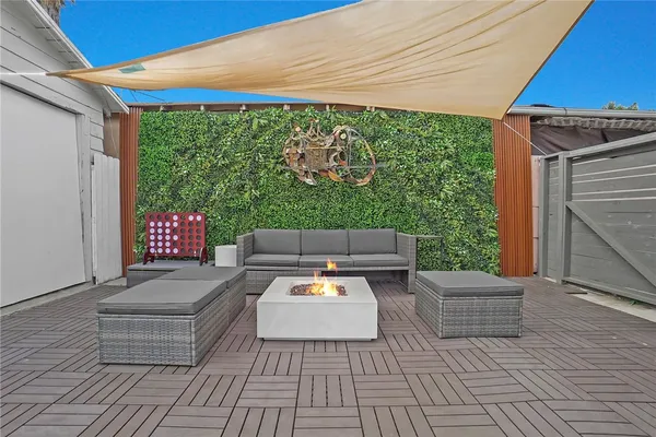 a backyard of a house with seating space