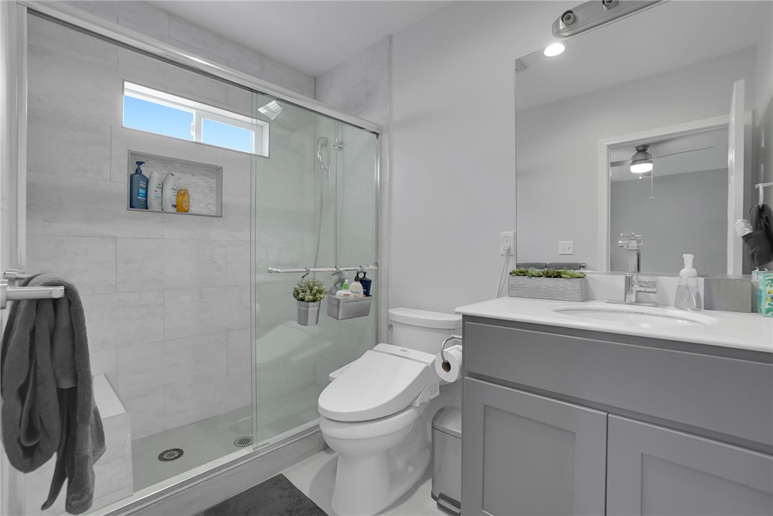 3541 Gibson Road El Monte, CA 91731 - Photo 24 of 38 a bathroom with a toilet a sink and shower