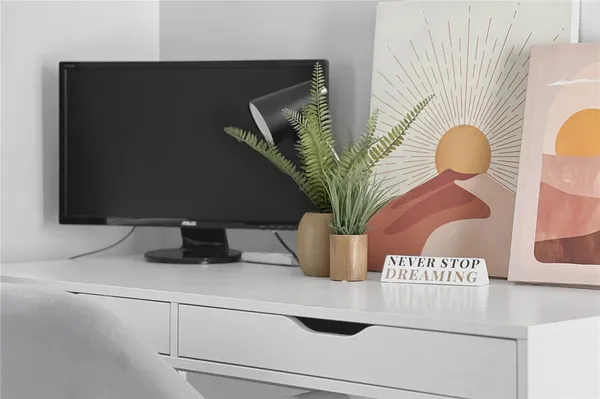 a vase of flowers sitting on a table