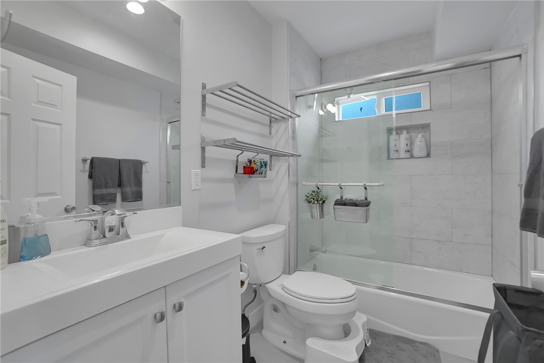 3541 Gibson Road El Monte, CA 91731 - Photo 27 of 38 a bathroom with a sink a toilet and shower