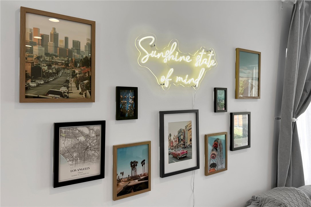 3541 Gibson Road El Monte, CA 91731 - Photo 5 of 38 a view of a hallway with paintings on the wall