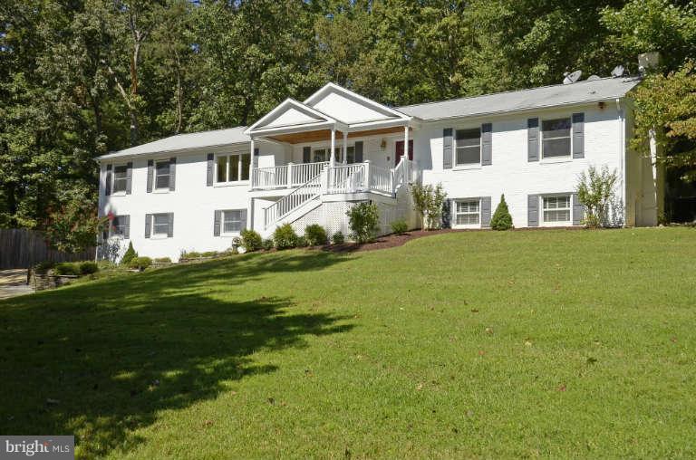 10628 Hunters Valley Road Vienna, VA 22181 - Photo 1 of 30 Beautiful Rambler overlooking two acre lot