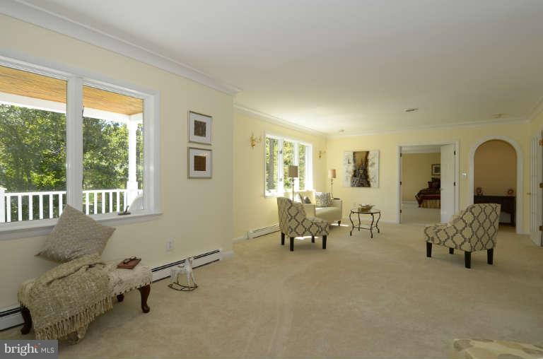 10628 Hunters Valley Road Vienna, VA 22181 - Photo 3 of 30 Sun-filed room with large picture windows