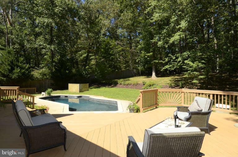 10628 Hunters Valley Road Vienna, VA 22181 - Photo 22 of 30 Rear deck overlooking the Anthony pool