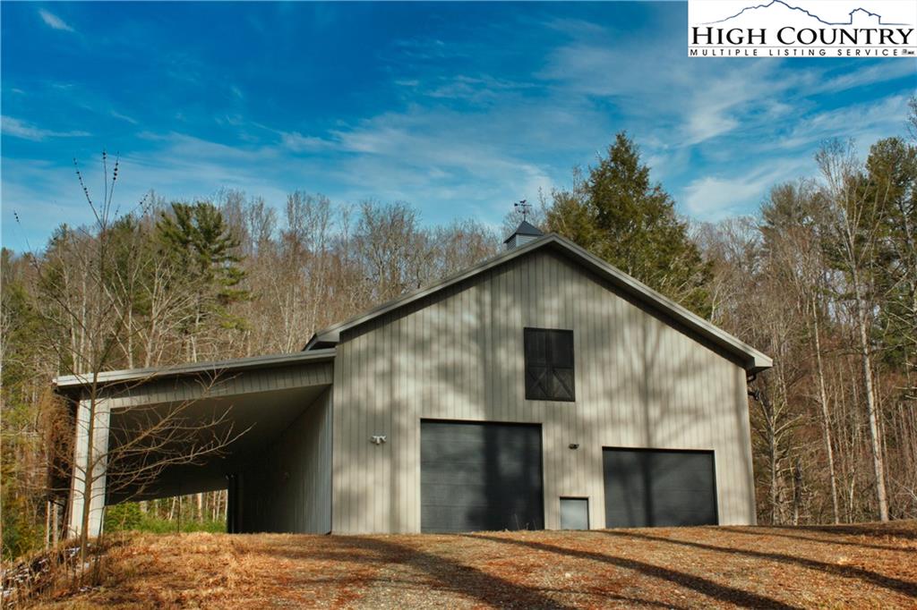 1520 Meadow Road Ferguson, NC 28624 - Photo 1 of 44 a view of a house with a backyard