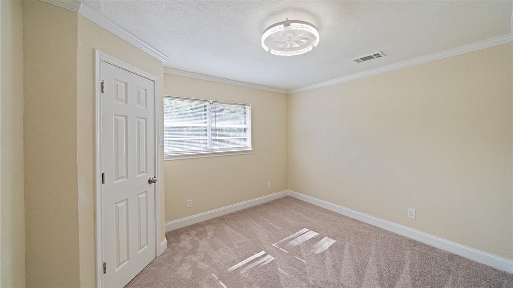 539 Edmonson Avenue Athens, TX 75751 - Photo 19 of 21 an empty room with a window