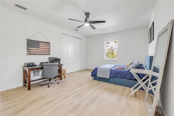 a workspace with furniture and a window