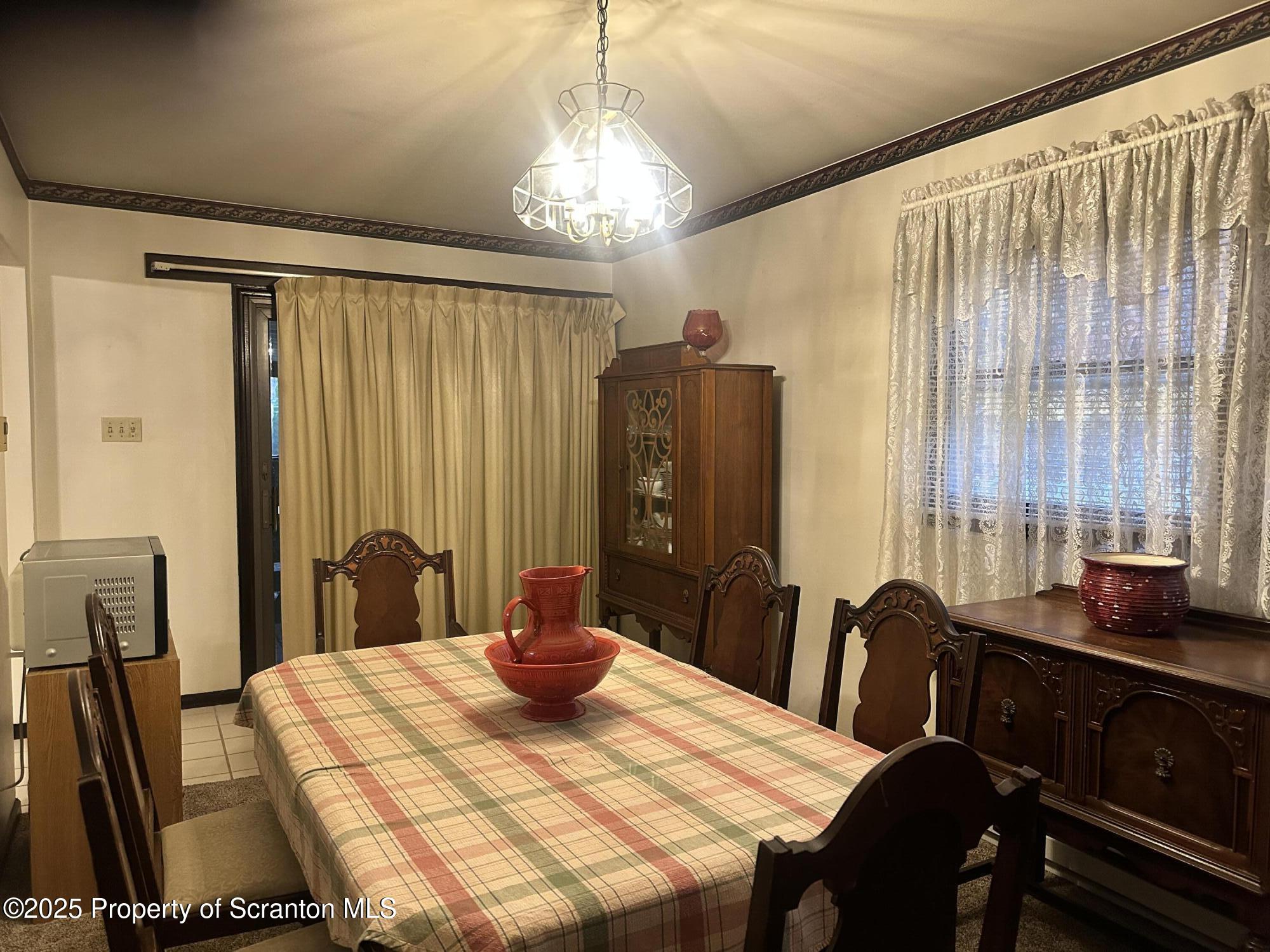 55 Yorktown Road Mountain Top, PA 18707 - Photo 15 of 32 a dining room with large window