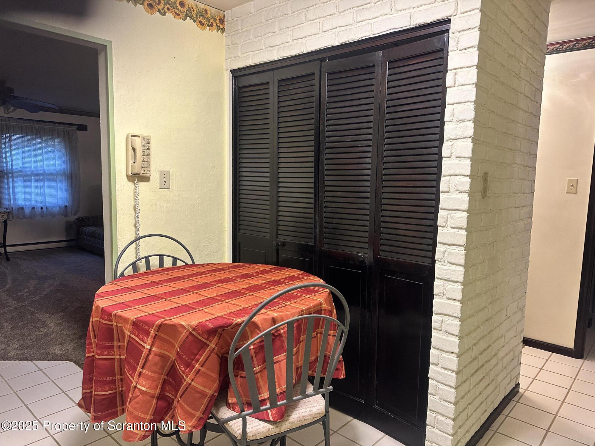 55 Yorktown Road Mountain Top, PA 18707 - Photo 8 of 32 a blue and white bench sitting in front of a door