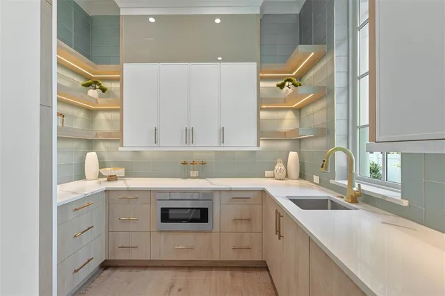 a bathroom with a tub and shower