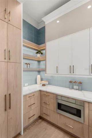 a white bath tub sitting in a bathroom