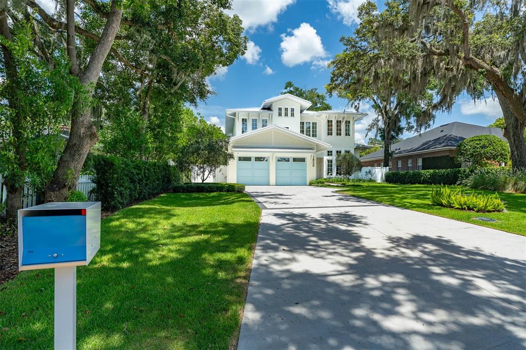 1820 Glencoe Road Winter Park, FL 32789 - Photo 3 of 75 a front view of a house with a yard and green space