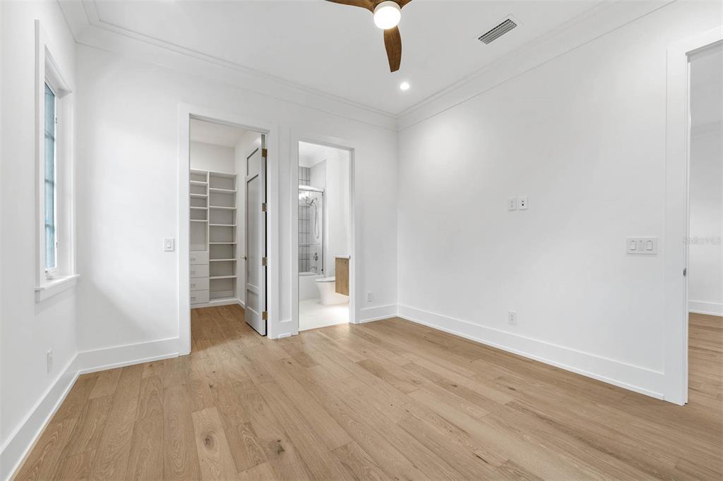 1820 Glencoe Road Winter Park, FL 32789 - Photo 40 of 75 an empty room with wooden floor cabinet and windows