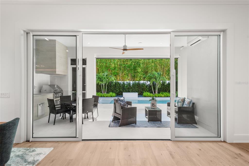 1820 Glencoe Road Winter Park, FL 32789 - Photo 52 of 75 a living room with furniture and a large window