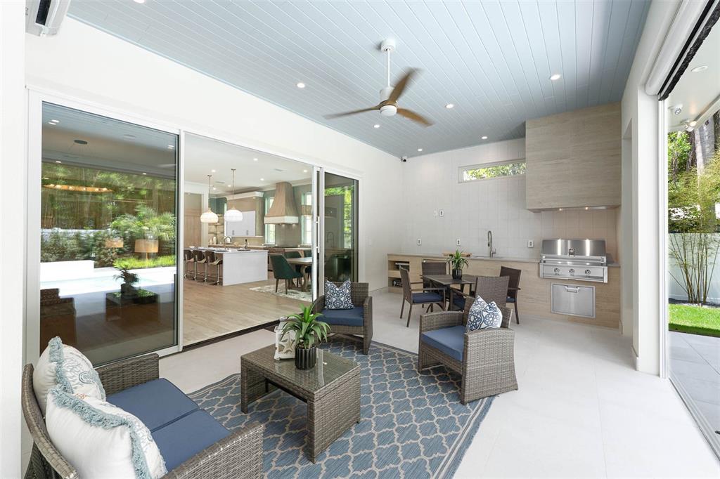 1820 Glencoe Road Winter Park, FL 32789 - Photo 54 of 75 a living room with furniture and a large window