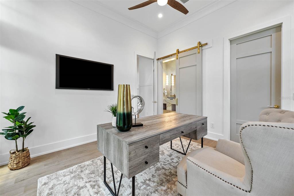 1820 Glencoe Road Winter Park, FL 32789 - Photo 10 of 75 a living room with furniture and a flat screen tv