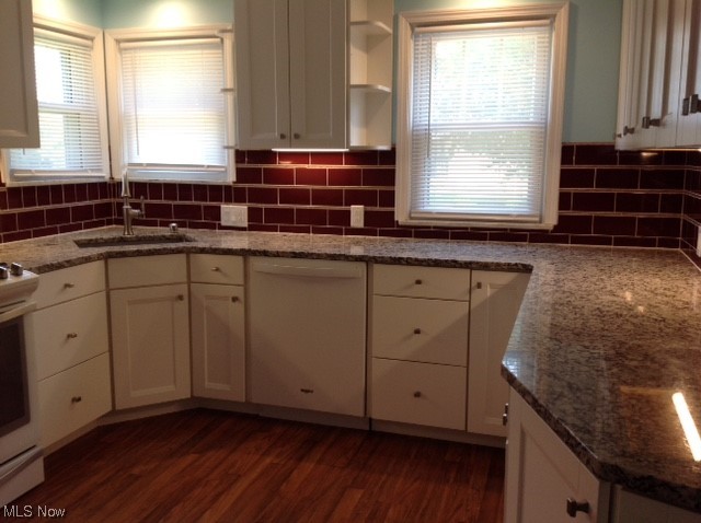 Newly-remodeled kitchen featuring plenty of natural light