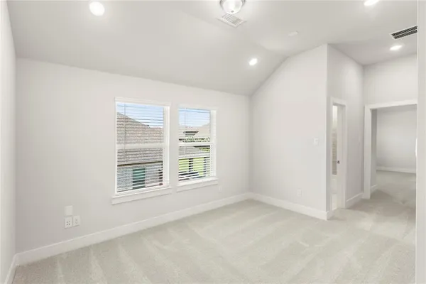 en empty room with windows