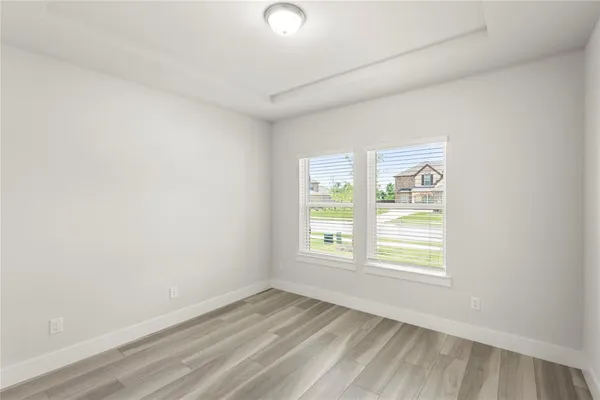 an empty room with windows