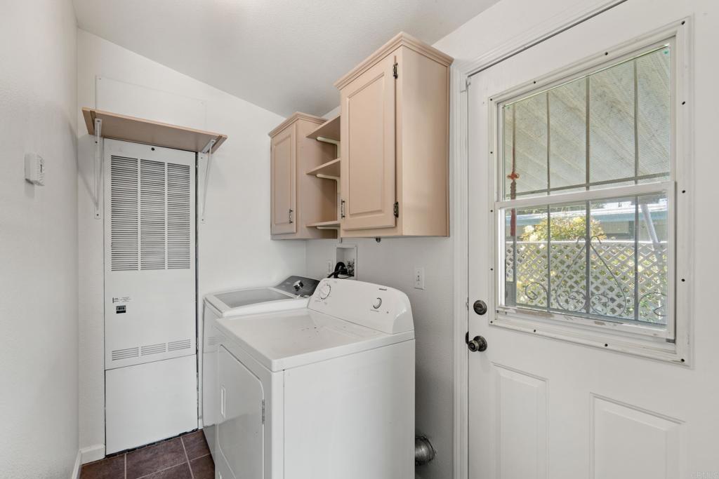 13125 Alpine Drive, Unit 212 Poway, CA 92064 - Photo 19 of 22 a utility room with dryer and washer