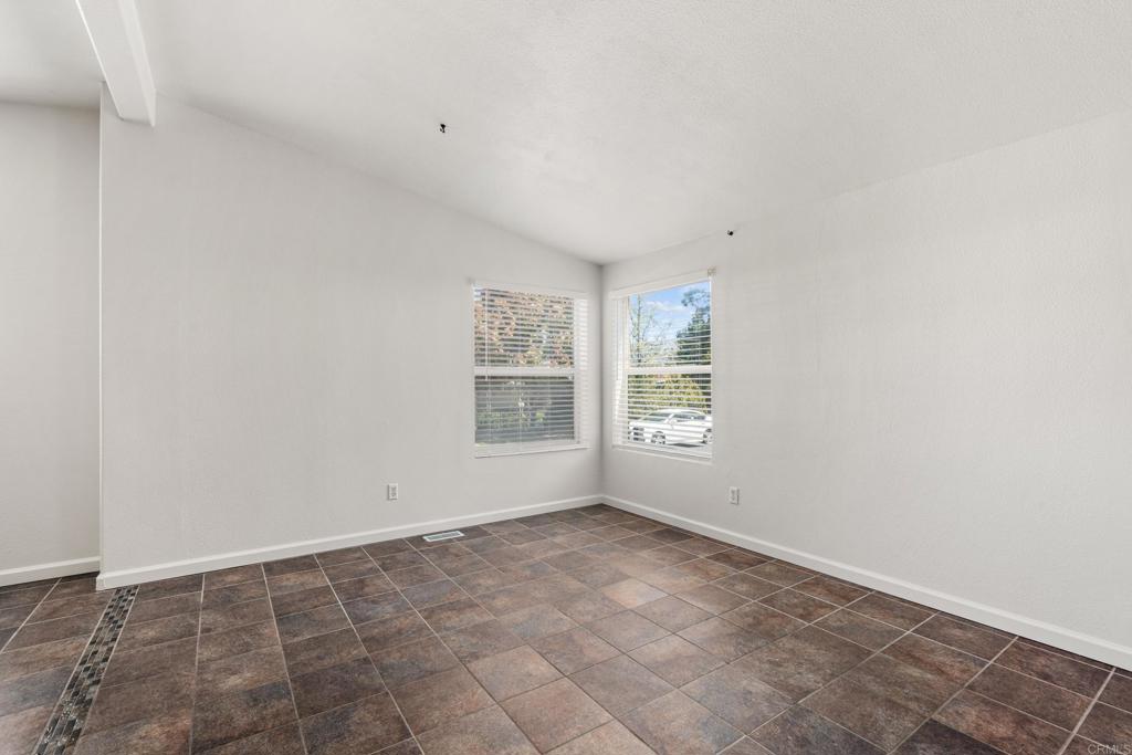13125 Alpine Drive, Unit 212 Poway, CA 92064 - Photo 7 of 22 an empty room with windows