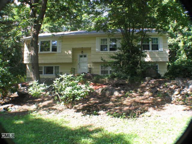 186 Great Plain Road Danbury, CT 06811 - Photo 1 of 1 a view of a house with a yard