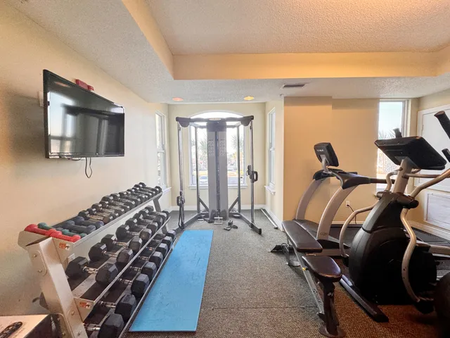 a view of a room with gym equipment