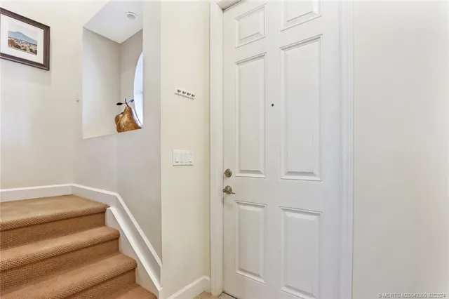 a view of hallway with stairs
