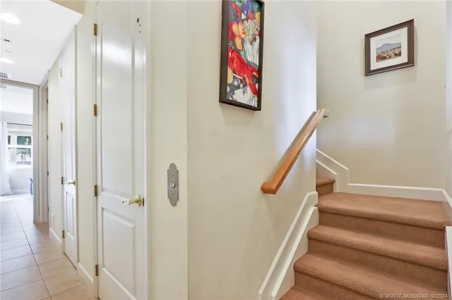 a view of an entryway with hallway