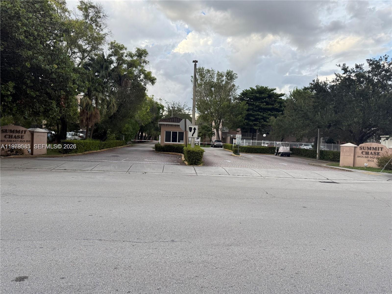 a view of a street with cars