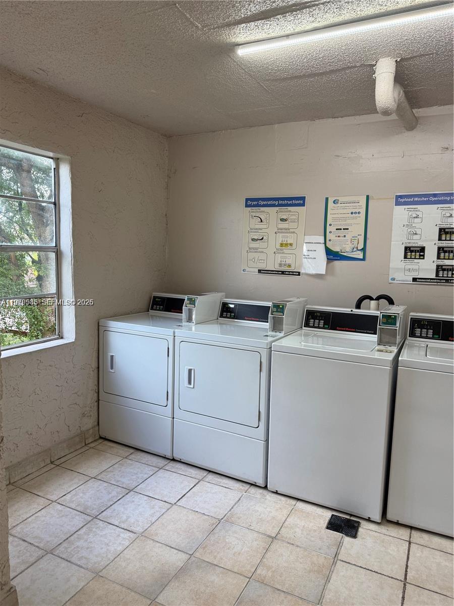 8405 Northwest 8th Street, Unit 304 Miami, FL 33126 - Photo 20 of 24 a room with storage and utility