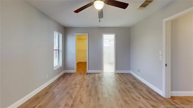 a view of a room with racks on the wall