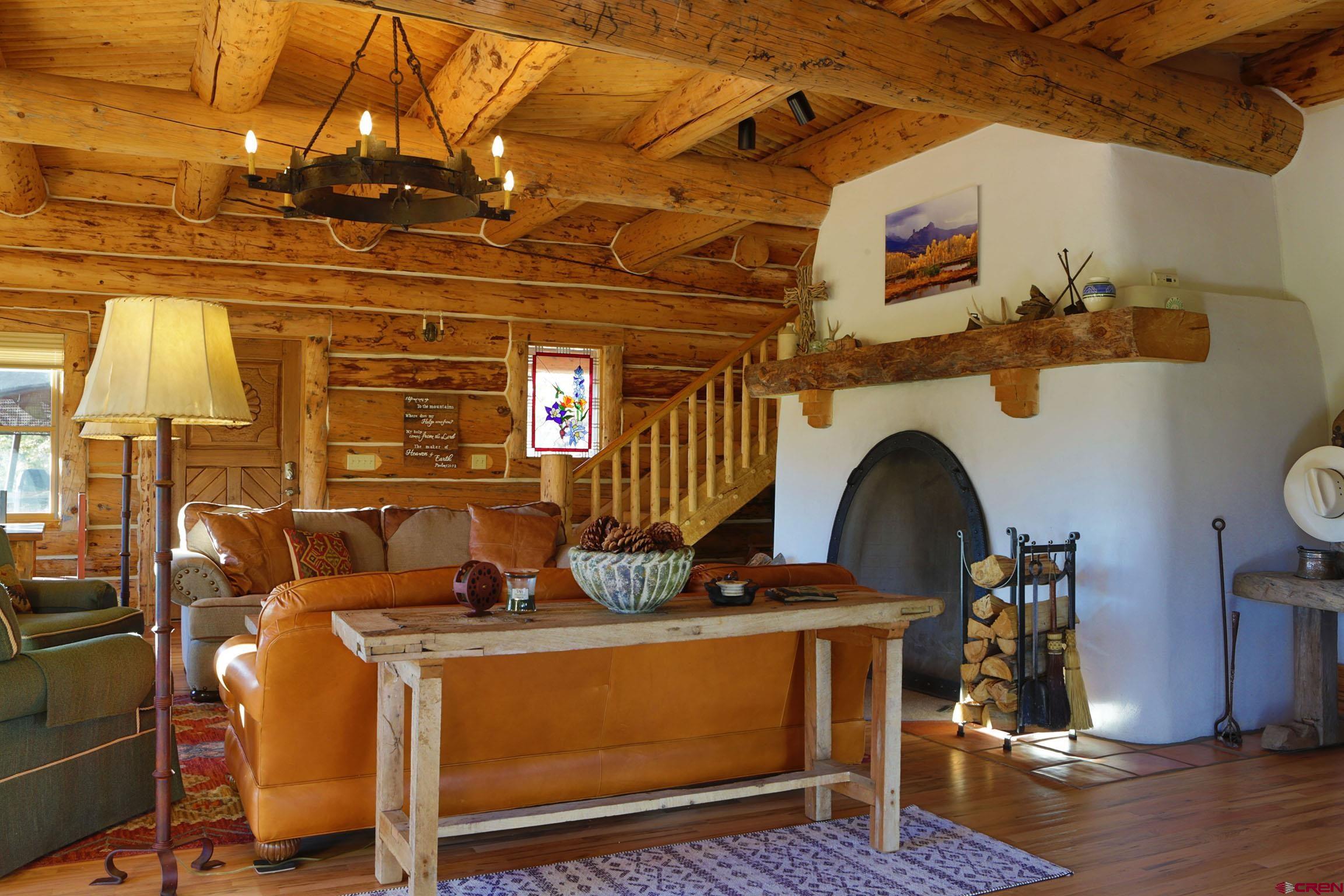 950 County Road 10 Ridgway, CO 81432 - Photo 11 of 32 a view of livingroom with fireplace and furniture