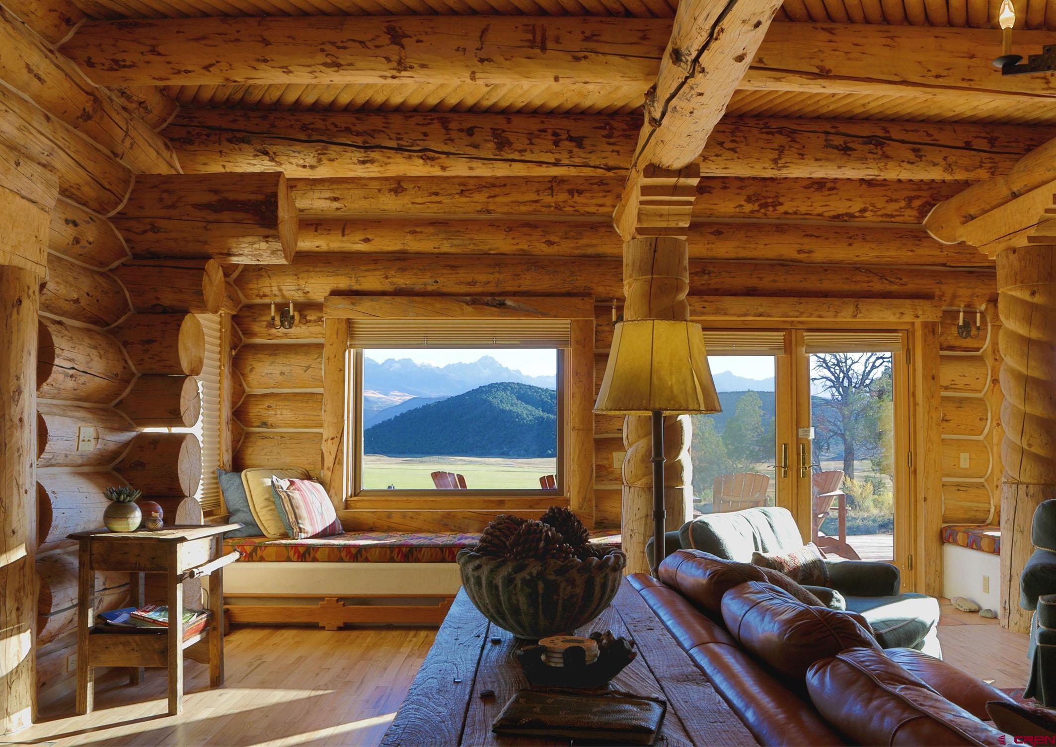 950 County Road 10 Ridgway, CO 81432 - Photo 13 of 32 a living room with furniture and a large window