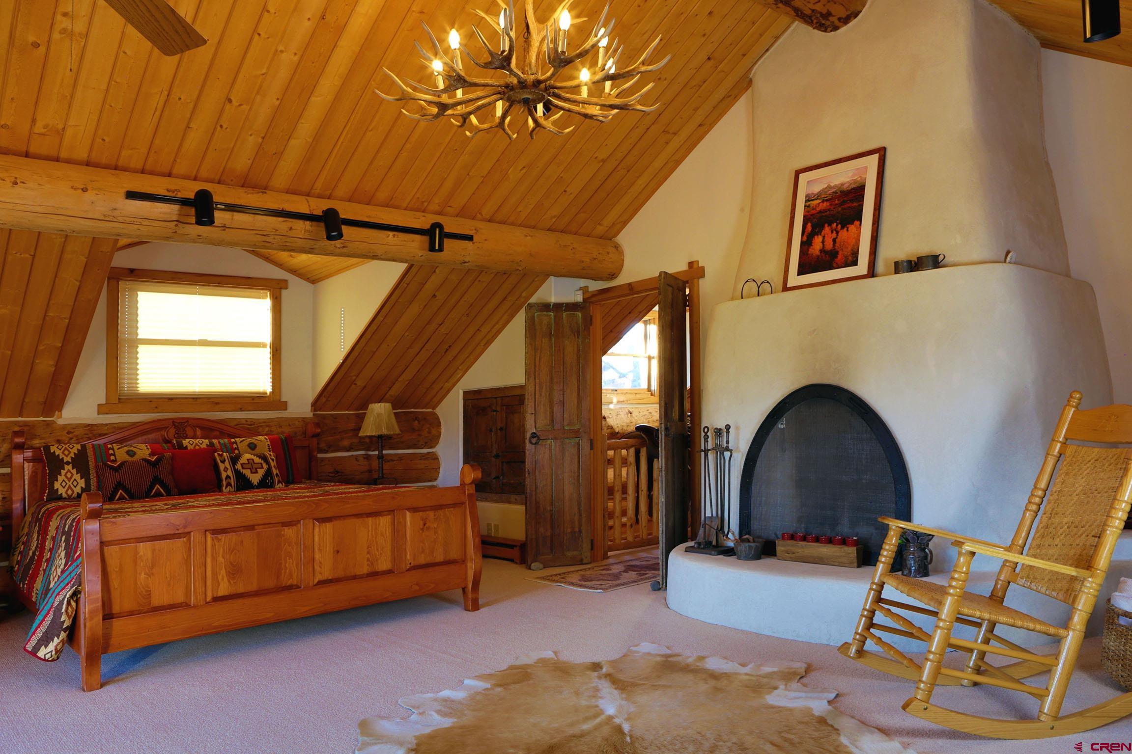 950 County Road 10 Ridgway, CO 81432 - Photo 23 of 32 a living room with furniture and a wooden floor