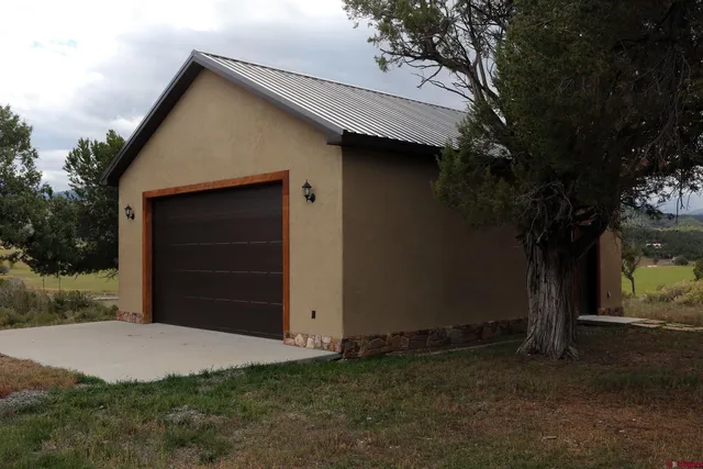 a front view of house with a yard