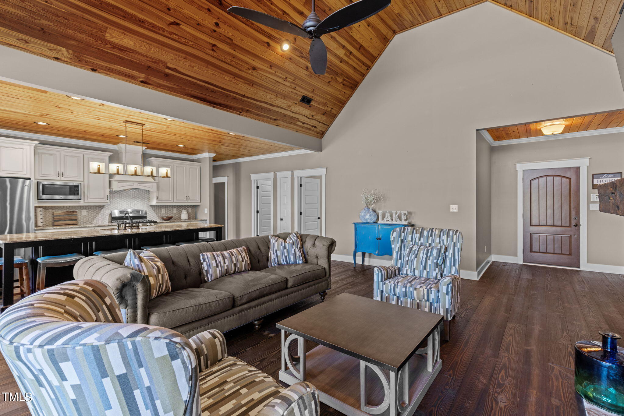 186 Polaris Point Semora, NC 27343 - Photo 14 of 73 a living room with furniture a ceiling fan and a rug