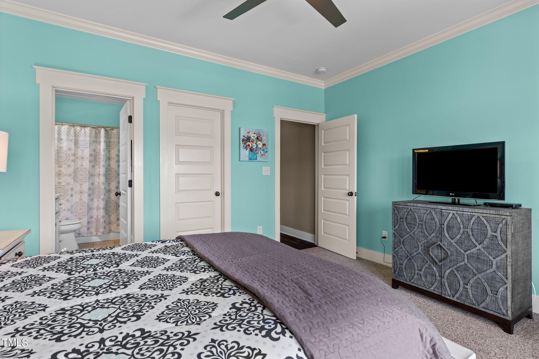 186 Polaris Point Semora, NC 27343 - Photo 31 of 73 a bedroom with a bed and a flat screen tv