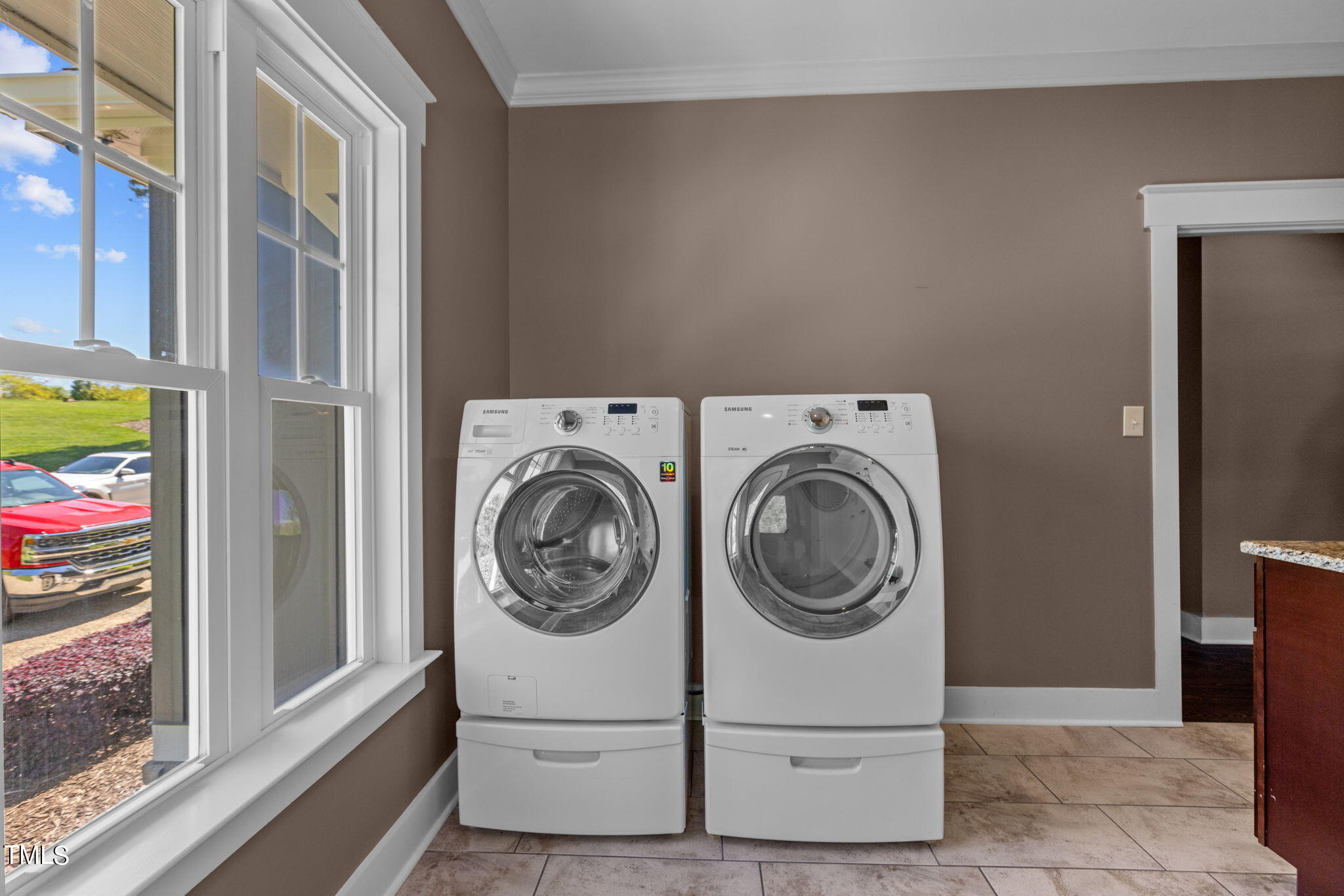 186 Polaris Point Semora, NC 27343 - Photo 36 of 73 a view of washer and dryer in a utility room