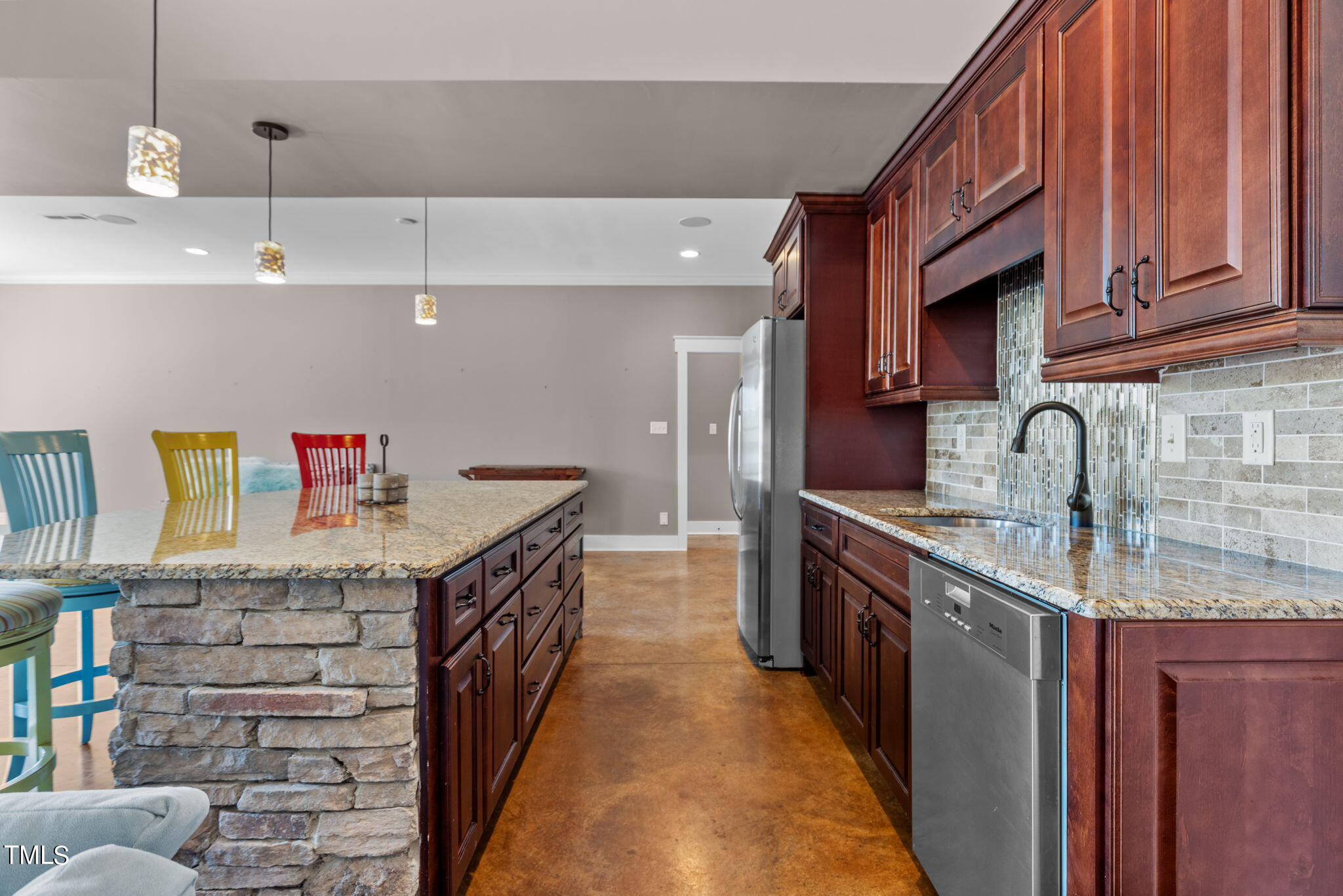 186 Polaris Point Semora, NC 27343 - Photo 42 of 73 a kitchen with stainless steel appliances granite countertop a sink and cabinets