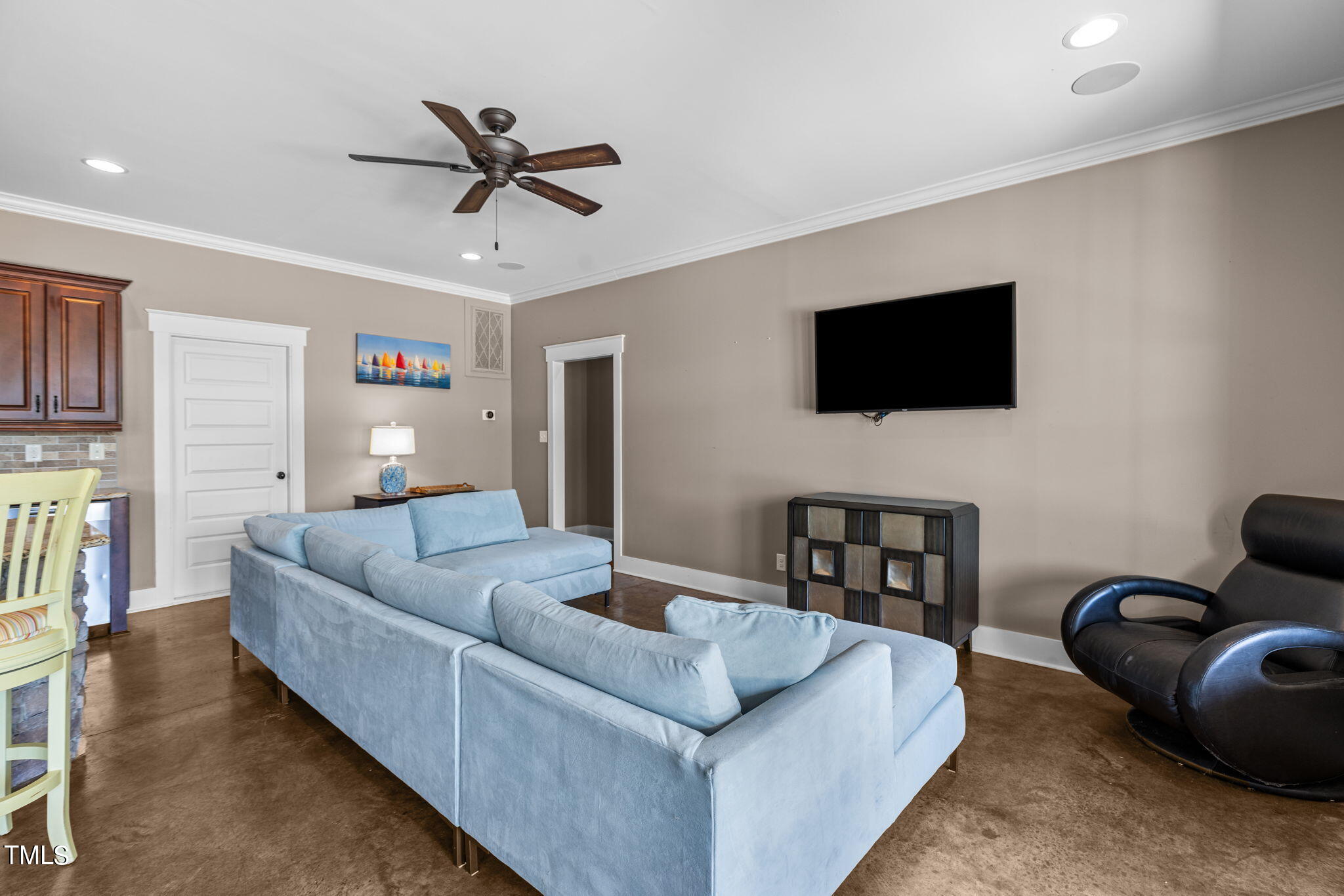 186 Polaris Point Semora, NC 27343 - Photo 44 of 73 a living room with furniture and a flat screen tv