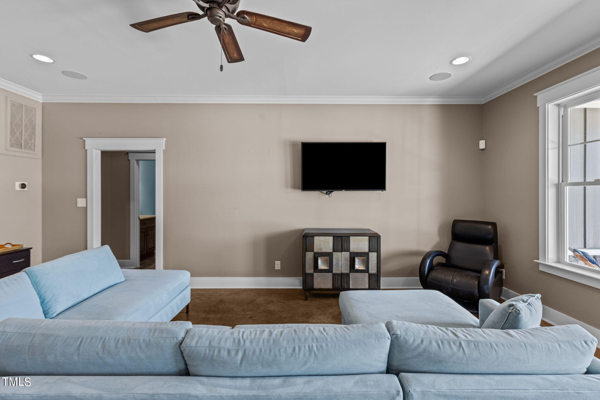 186 Polaris Point Semora, NC 27343 - Photo 45 of 73 a living room with furniture and a flat screen tv