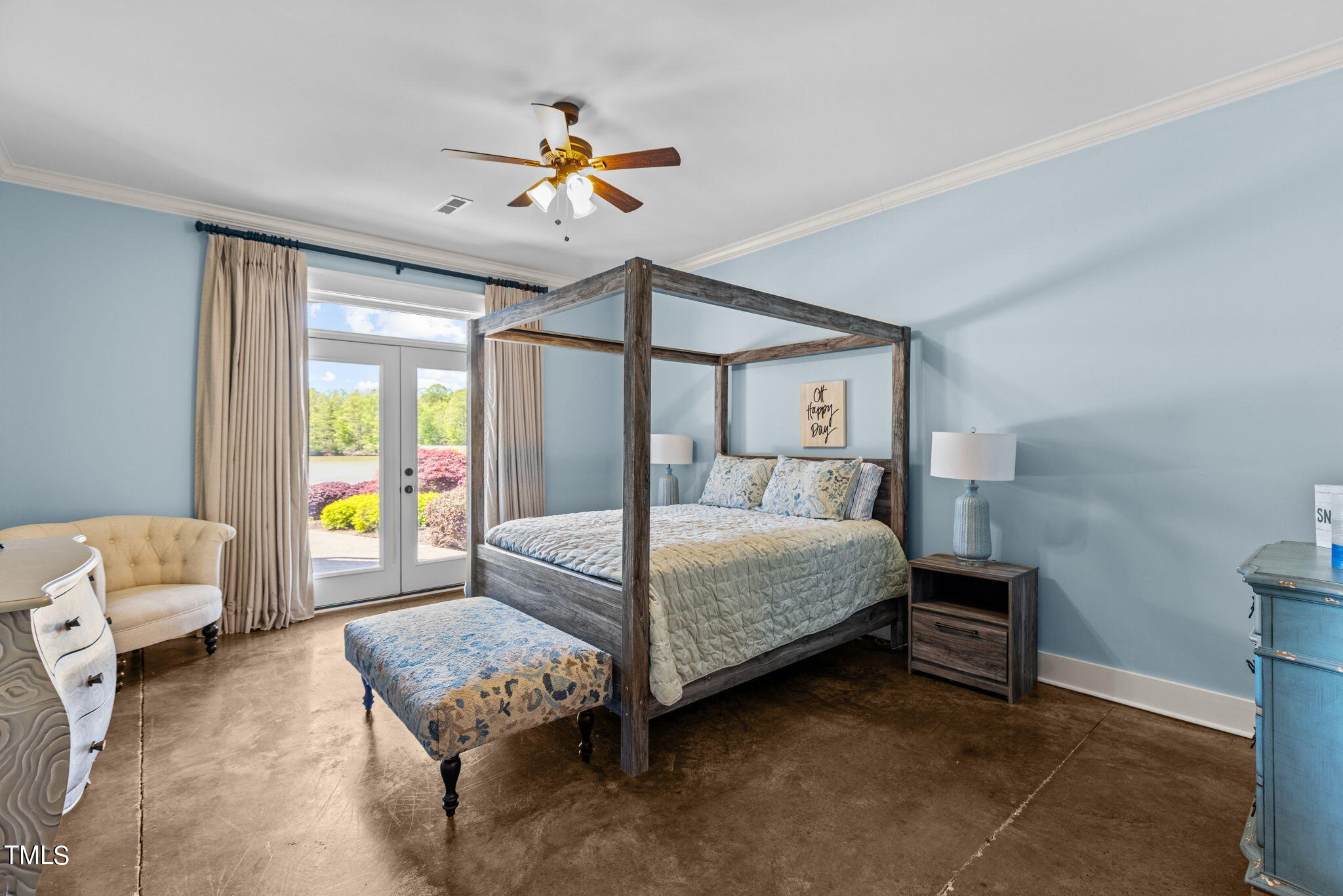 186 Polaris Point Semora, NC 27343 - Photo 48 of 73 a bedroom with a bed and a chandelier