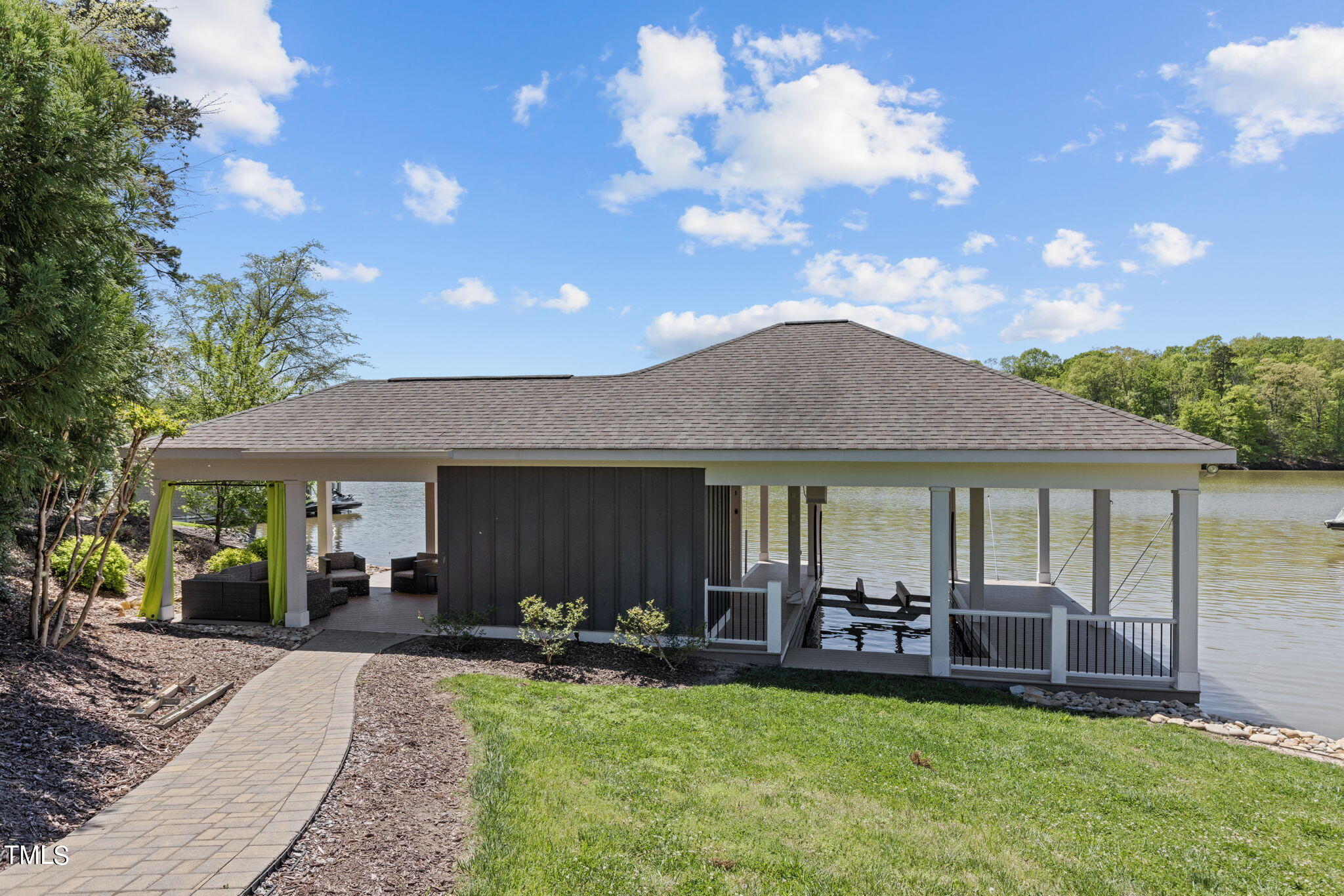186 Polaris Point Semora, NC 27343 - Photo 55 of 73 a view of a house with backyard porch and sitting area