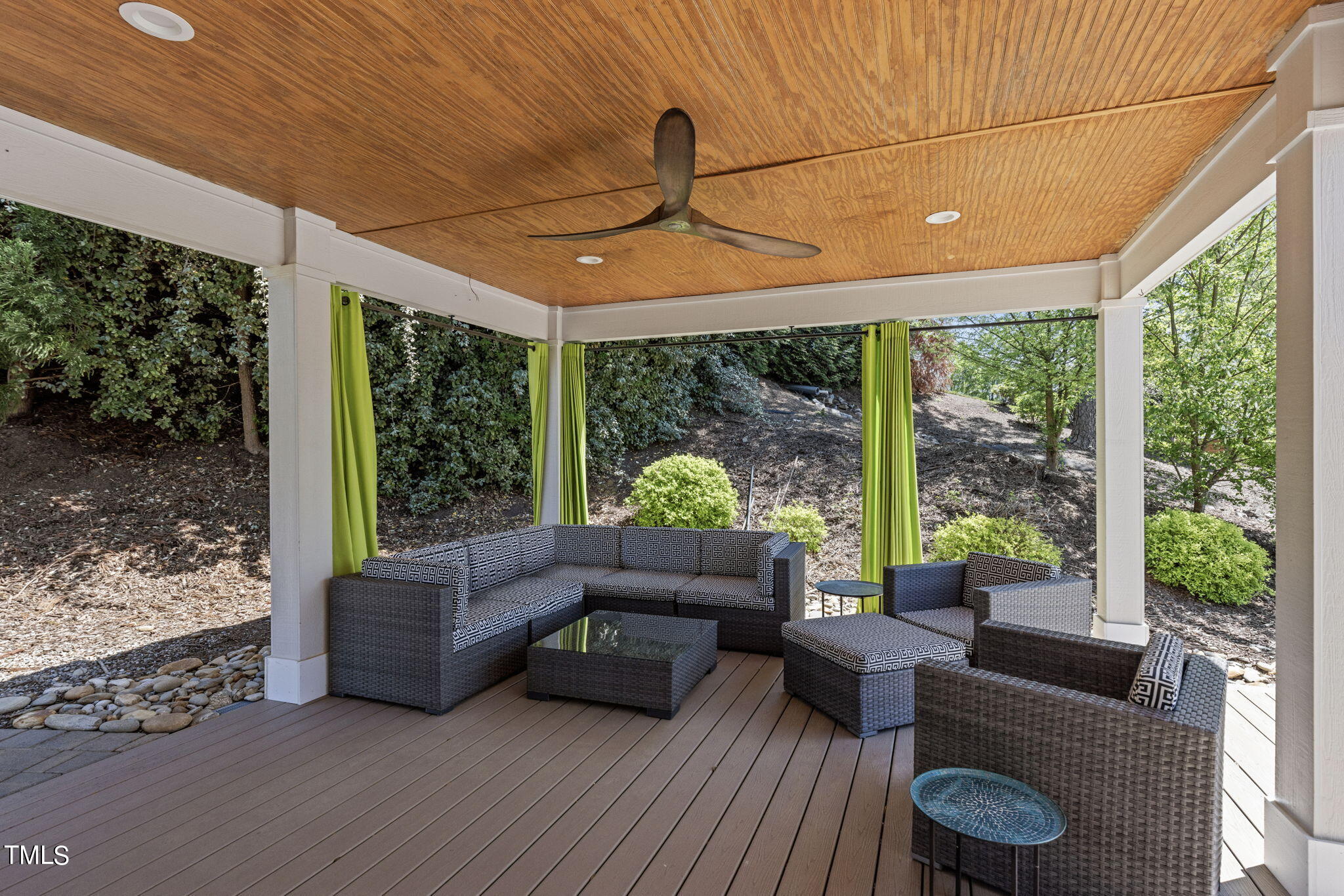 186 Polaris Point Semora, NC 27343 - Photo 57 of 73 a living room with furniture and a floor to ceiling window