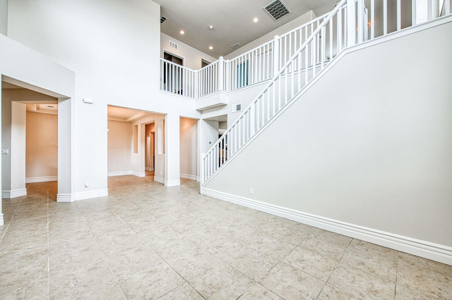 3036 Portals Avenue Clovis, CA 93619 - Photo 13 of 53 a view of an entryway with staircase