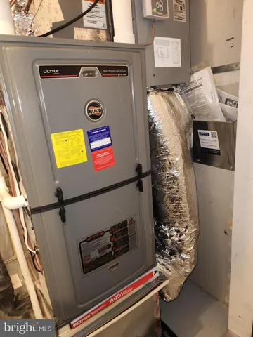 a table with chairs and a stove