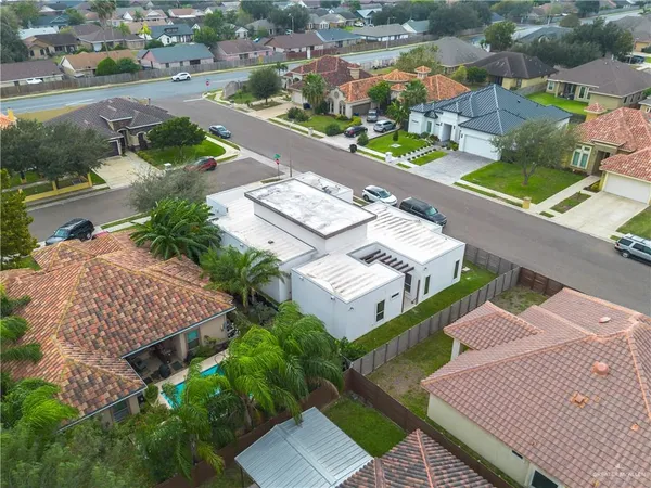 an aerial view of a house with a garden