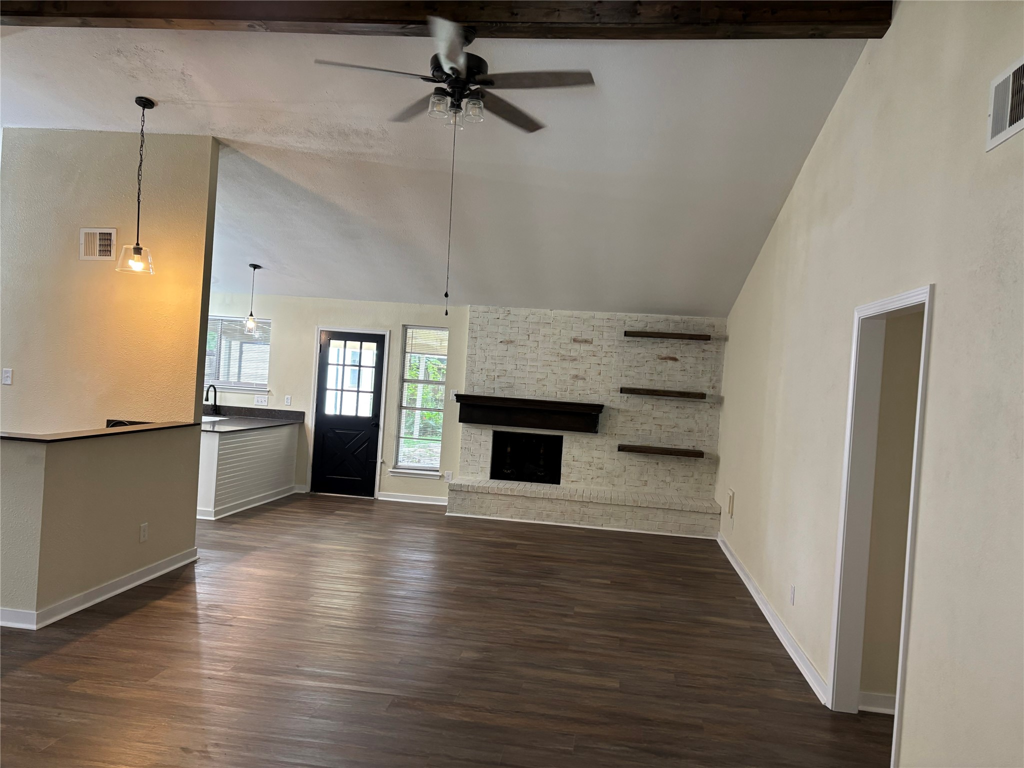 23726 Farm Hill Drive Spring, TX 77373 - Photo 4 of 11 a view of a kitchen with a sink and a kitchen counter top space